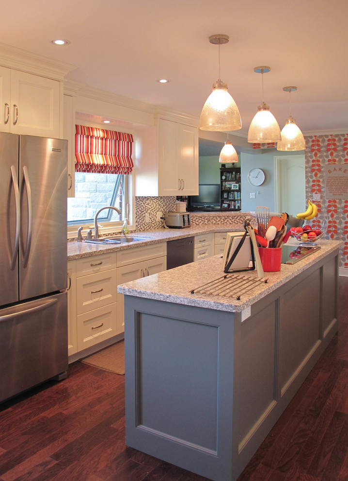 Inspiration for a transitional kitchen in Toronto with recessed-panel cabinets, white cabinets and with island.