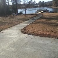 new porches, concrete sidewalk and dock
