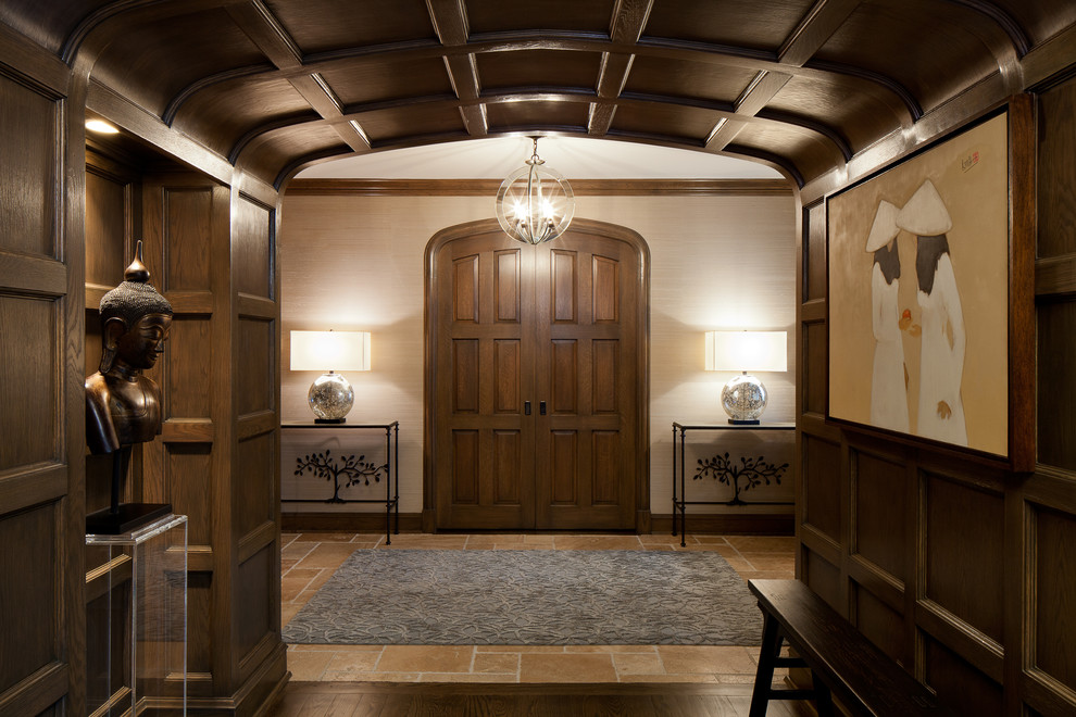 Photo of an asian foyer in Chicago with beige walls, a double front door and a dark wood front door.