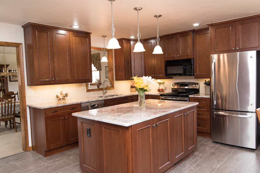 Large elegant l-shaped vinyl floor and beige floor eat-in kitchen photo in Baltimore with an undermount sink, shaker cabinets, medium tone wood cabinets, granite countertops, beige backsplash, ceramic backsplash, stainless steel appliances, an island and white countertops