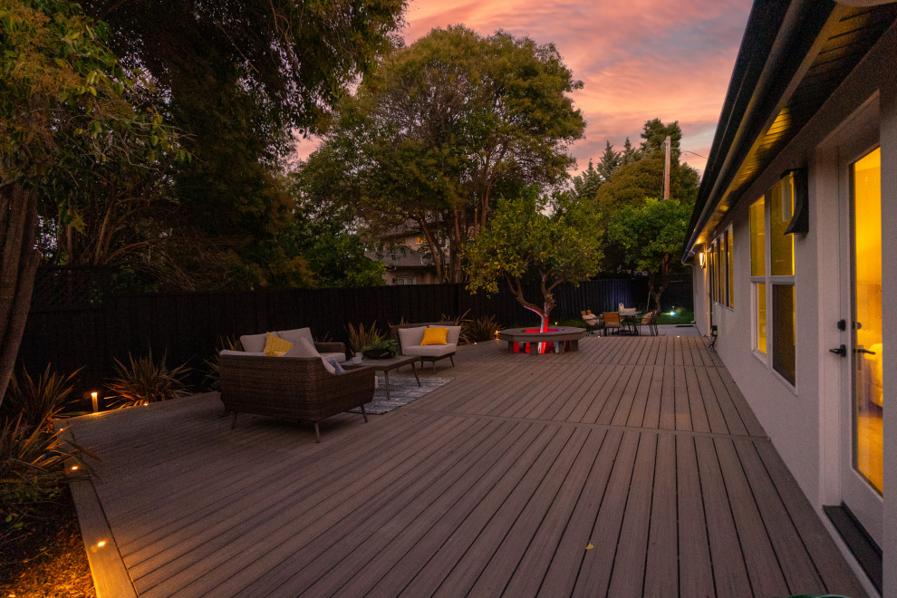 Mid-sized transitional backyard deck photo in San Francisco