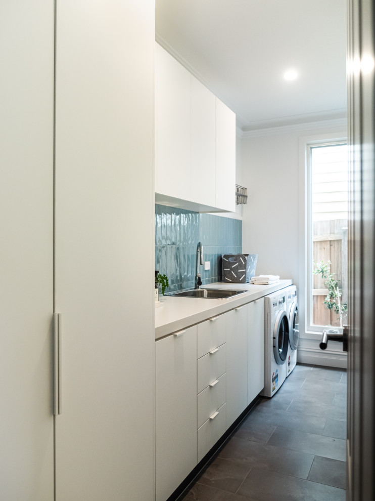 Inspiration for a contemporary laundry room in Melbourne.