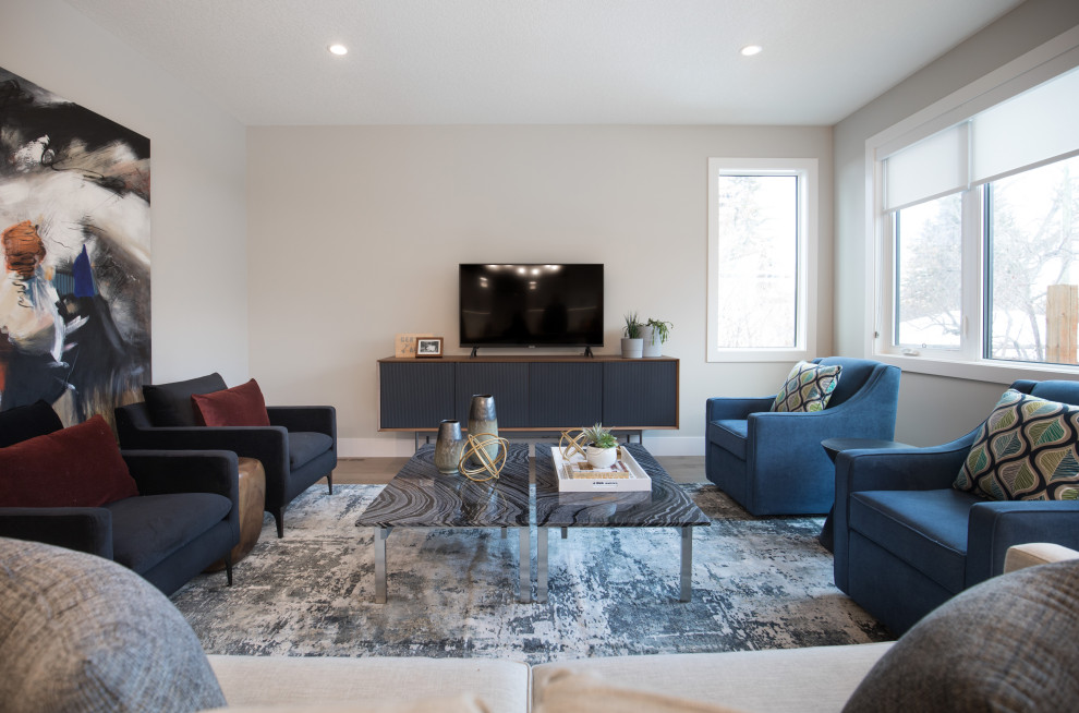 Example of a mid-sized transitional open concept light wood floor and brown floor living room design in Calgary with no fireplace and a tv stand