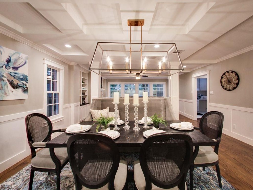 Inspiration for a mid-sized transitional medium tone wood floor and brown floor great room remodel with beige walls and no fireplace