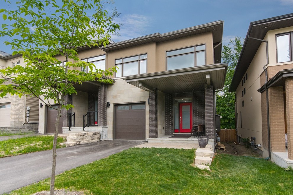 Transitional home design photo in Ottawa