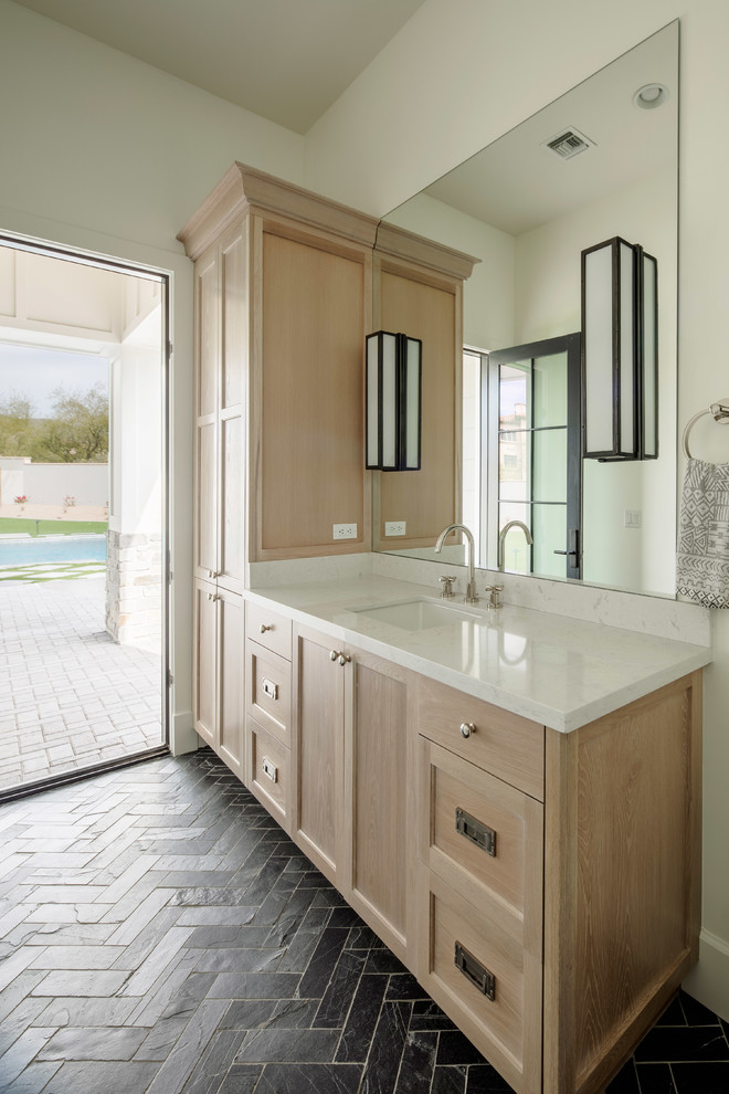This is an example of a large country master bathroom in Phoenix with shaker cabinets, white cabinets, a freestanding tub, an open shower, a one-piece toilet, white tile, marble, white walls, marble floors, an undermount sink, engineered quartz benchtops, grey floor, a hinged shower door and grey benchtops.