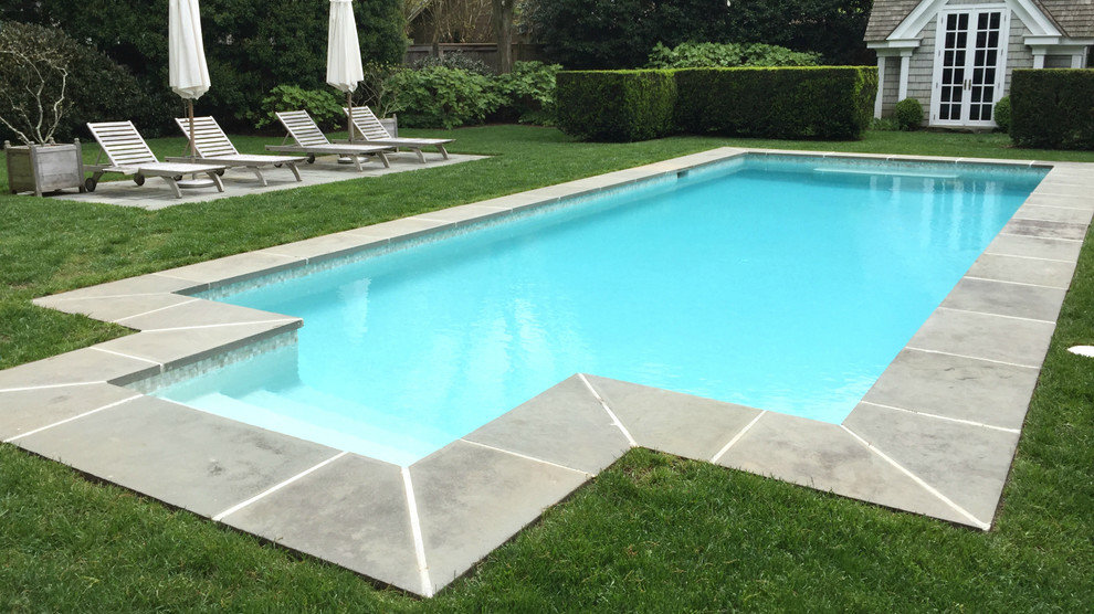Inspiration for a mid-sized backyard rectangular pool remodel