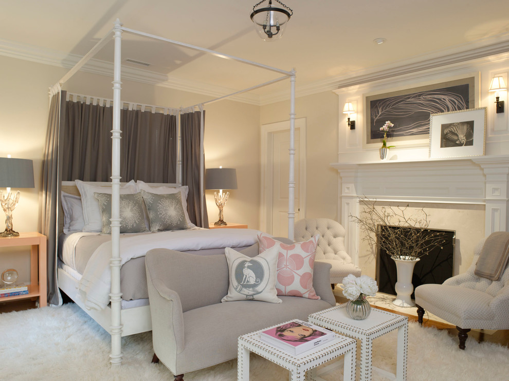 Inspiration for a mid-sized transitional guest bedroom in Dallas with beige walls, a standard fireplace, carpet, a stone fireplace surround and white floor.