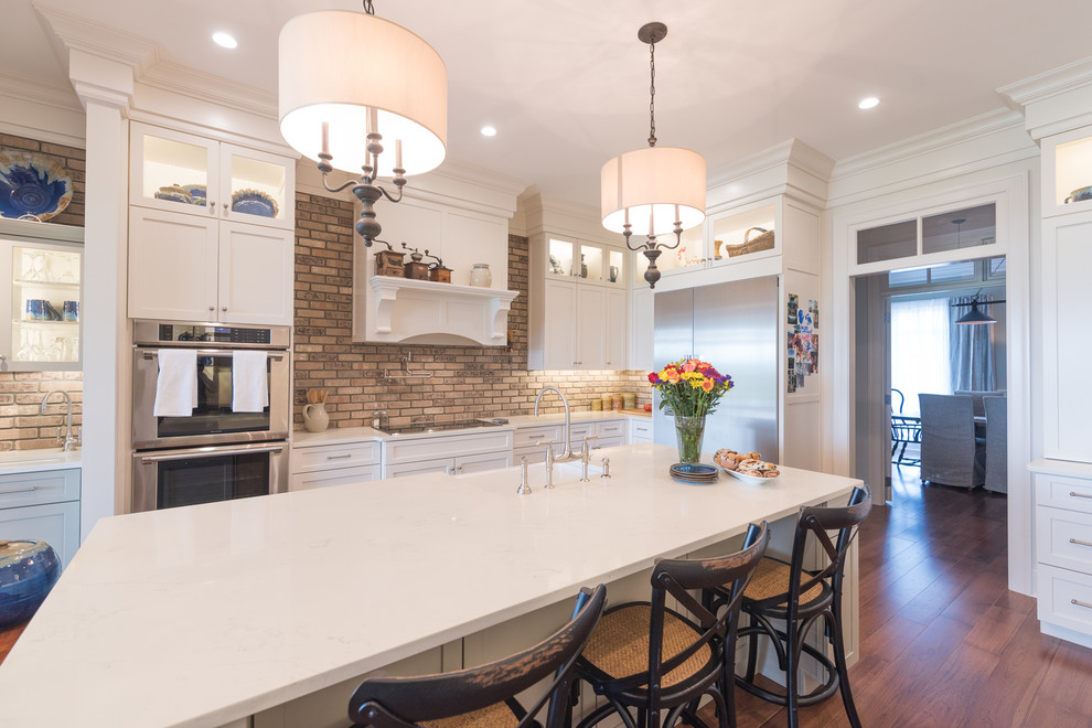 Example of a large transitional home design design