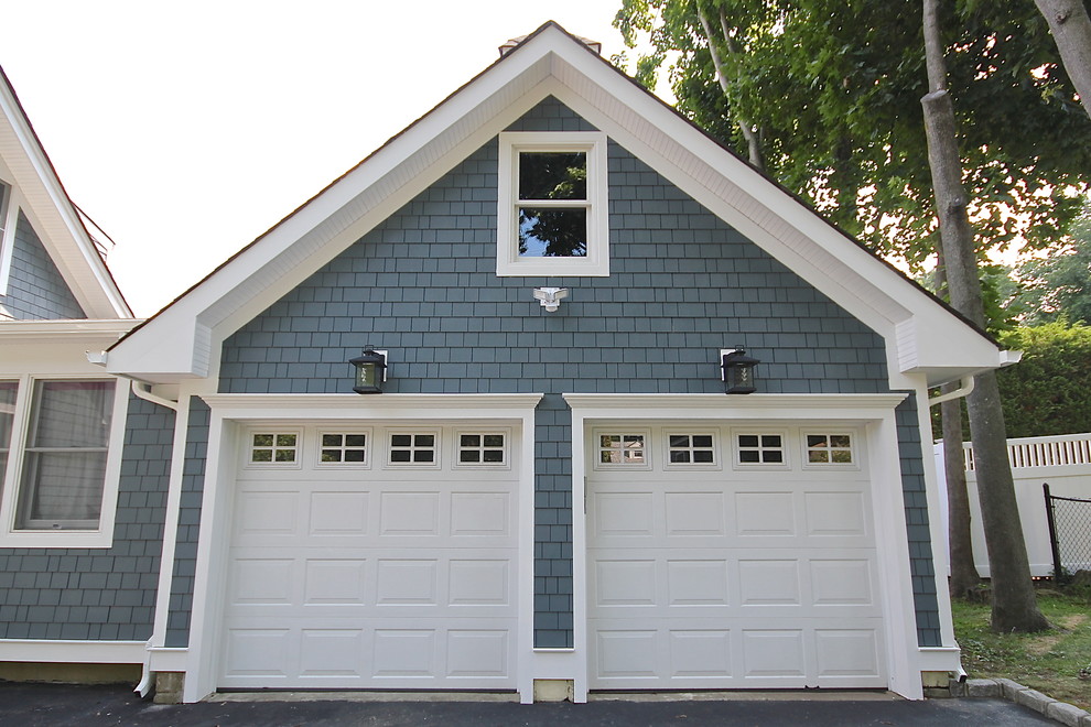 Photo of a beach style garage in New York.