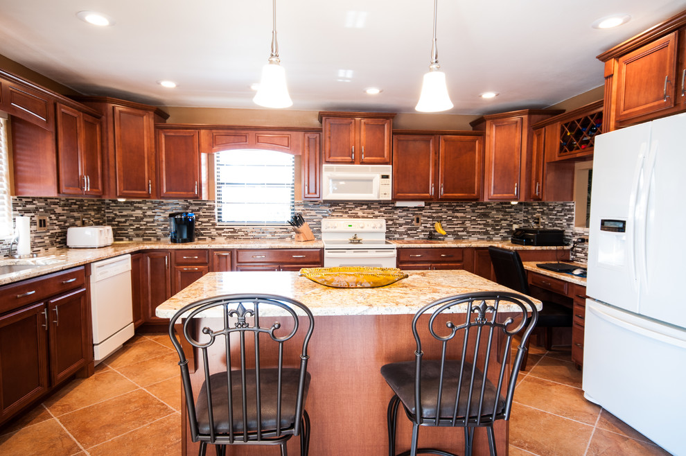 Enclosed kitchen - large transitional u-shaped ceramic tile enclosed kitchen idea in Tampa with an undermount sink, recessed-panel cabinets, dark wood cabinets, granite countertops, multicolored backsplash, subway tile backsplash, white appliances and an island