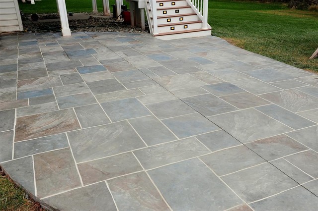 Backyard Patio With Multi Color Grouted Stamped Concrete