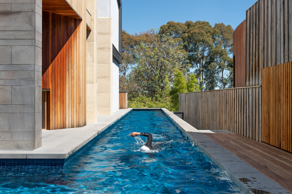Expansive contemporary l-shaped pool in Melbourne.