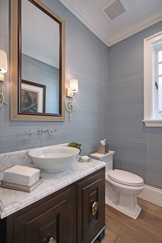 Design ideas for a transitional powder room in Orange County.