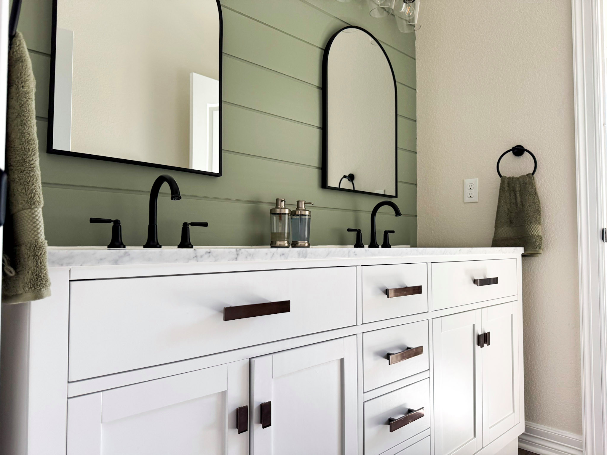 Custom guest bathroom vanity with functional storage, clean lines, and timeless finishes. Designed to feel elevated while remaining approachable.