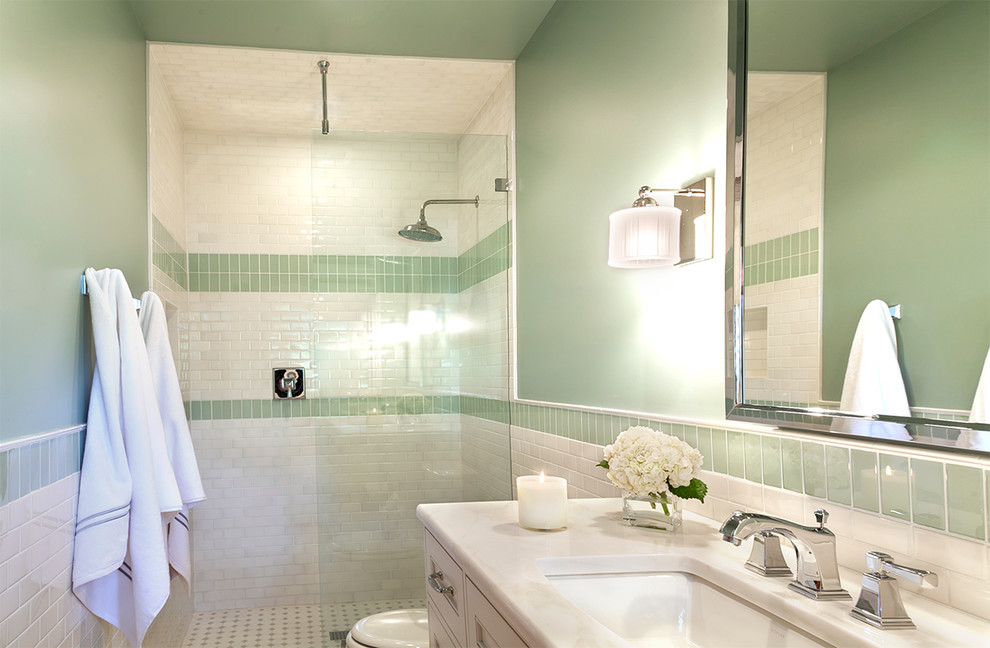 Small traditional 3/4 bathroom in Austin with shaker cabinets, white cabinets, marble benchtops, an undermount sink, an open shower, a two-piece toilet, white tile, glass tile, green walls and ceramic floors.