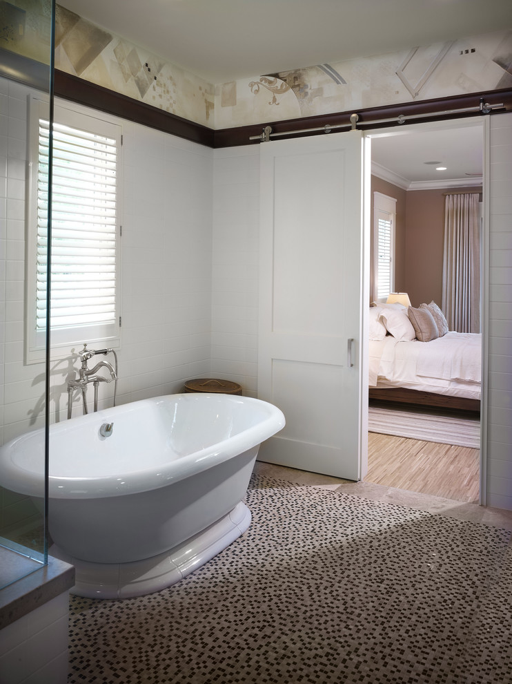 Photo of a contemporary bathroom in Tampa with a freestanding tub.