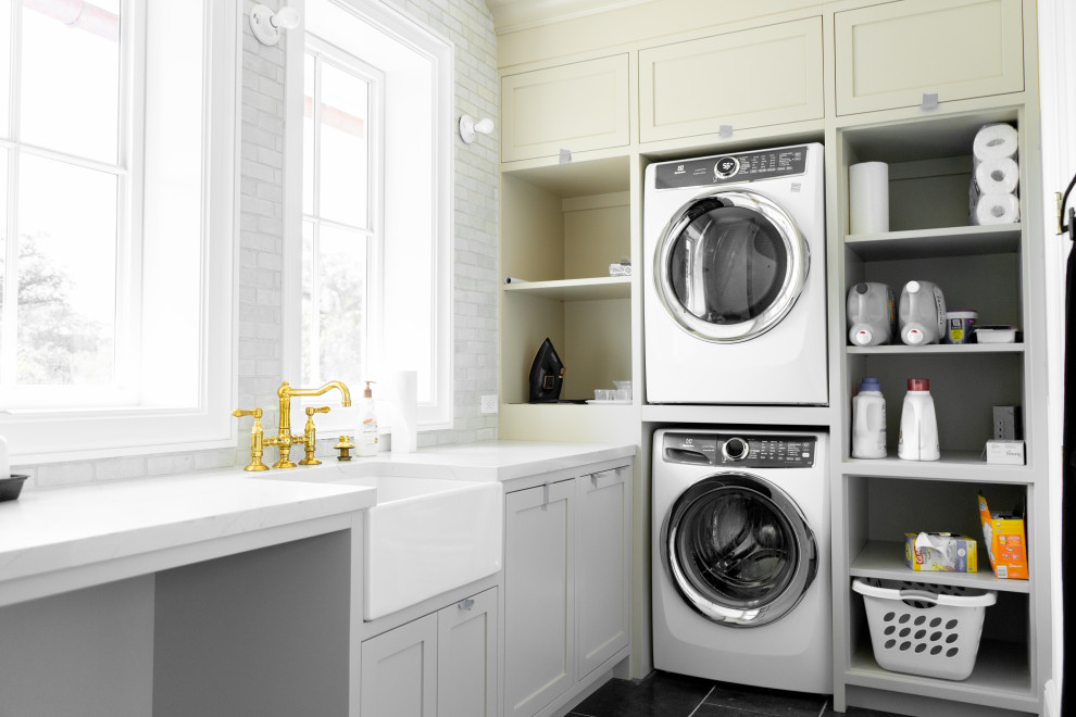 This is an example of a transitional laundry room in Miami.
