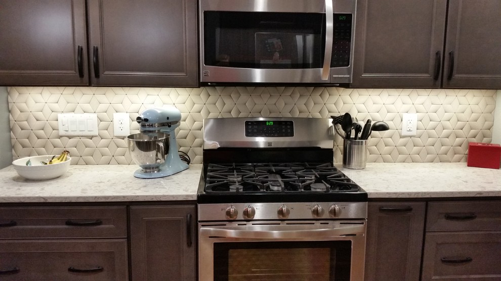 Kitchen - kitchen idea in Raleigh with stone tile backsplash