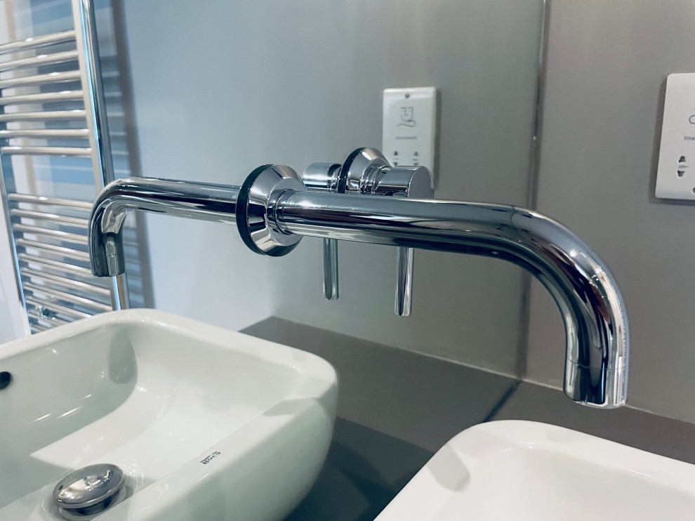 Mirror mounted taps