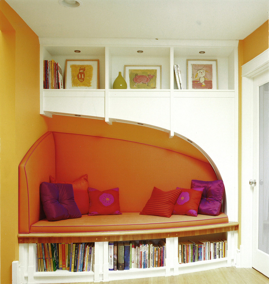Inspiration for an eclectic kids' room in Chicago with orange walls.