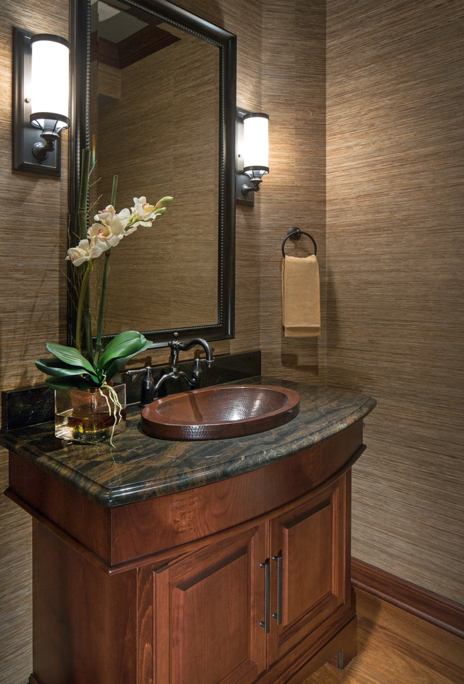 Photo of a traditional powder room in Omaha.