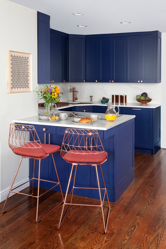 Inspiration for a small contemporary u-shaped kitchen pantry in New York with shaker cabinets, blue cabinets and a peninsula.