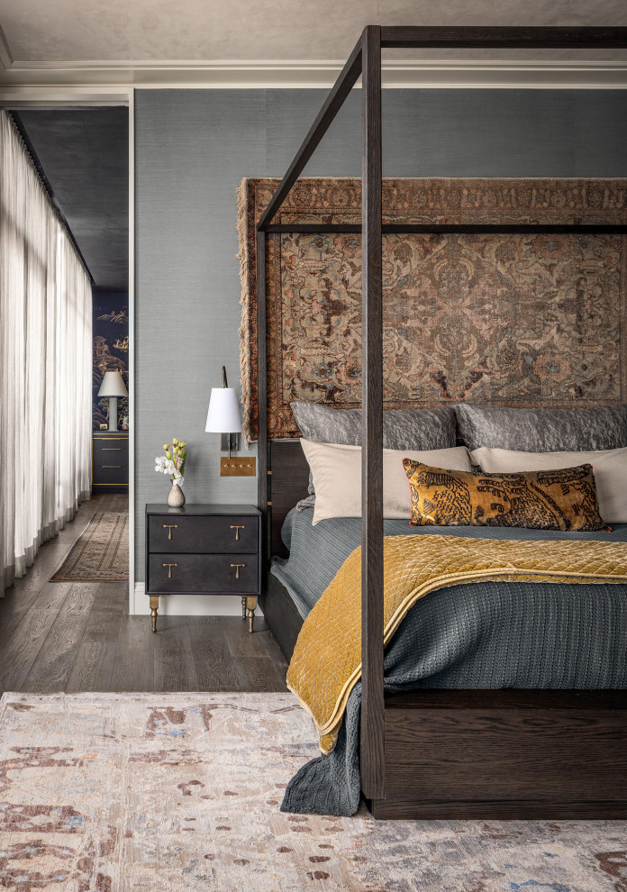 Example of a transitional dark wood floor, brown floor and wallpaper bedroom design in Tampa with gray walls