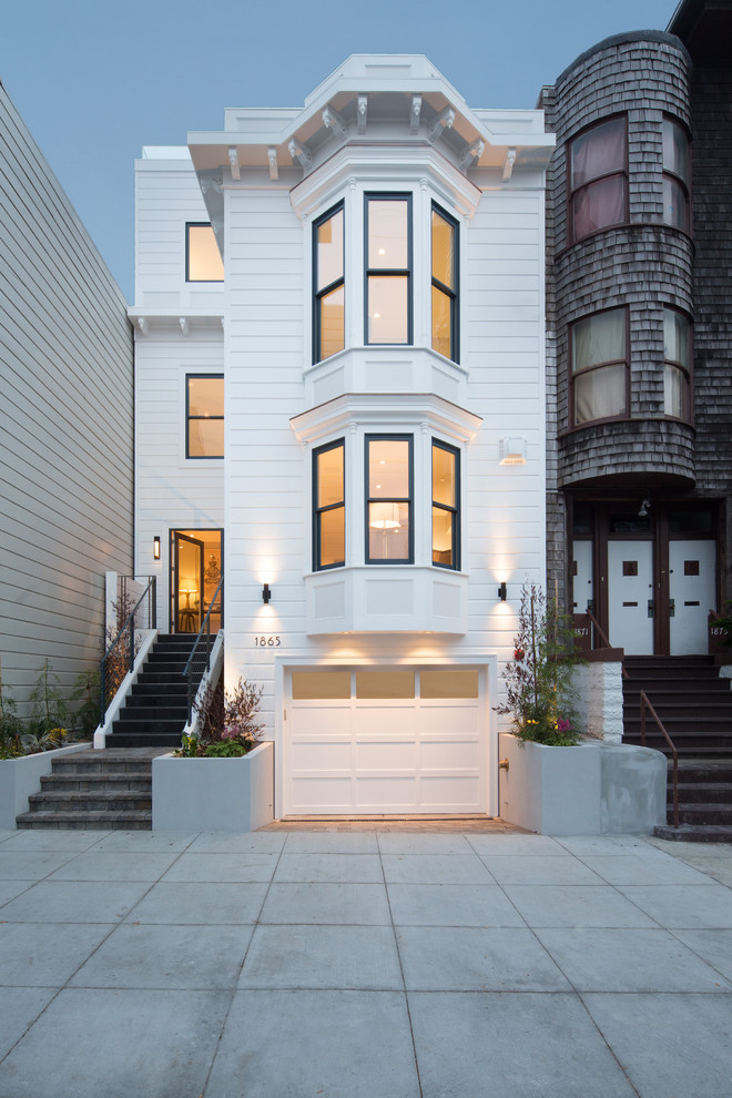 Mid-sized transitional two-storey white exterior in San Francisco with wood siding and a flat roof.