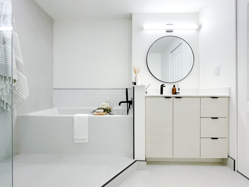 Medium sized modern grey and white ensuite bathroom in Toronto with flat-panel cabinets, a freestanding vanity unit, beige cabinets, an alcove bath, a walk-in shower, grey tiles, porcelain tiles, porcelain flooring, a submerged sink, engineered stone worktops, grey floors, an open shower, white worktops and a single sink.