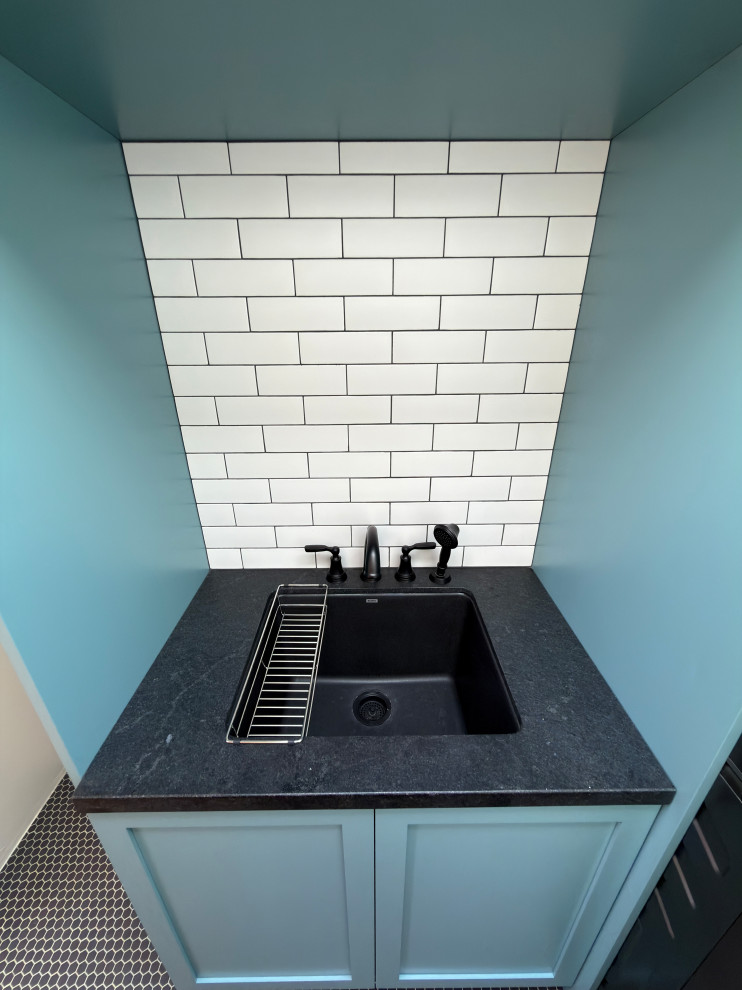 Compact Laundry and Utility Area with Built-In Sink