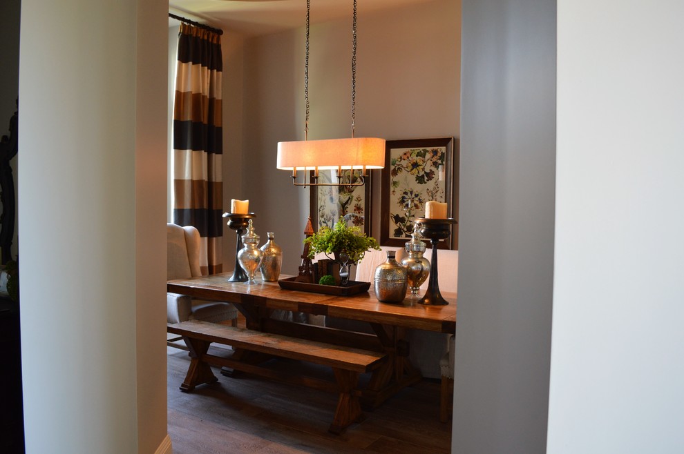 Enclosed dining room - transitional porcelain tile enclosed dining room idea in Phoenix with gray walls