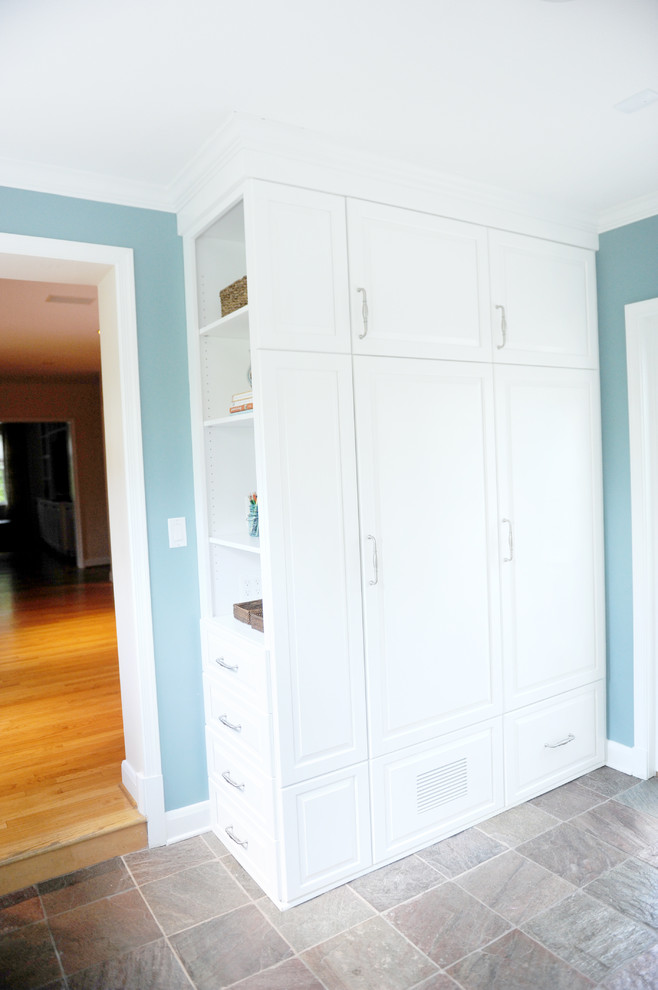 Mudroom - small transitional slate floor mudroom idea in Baltimore with blue walls