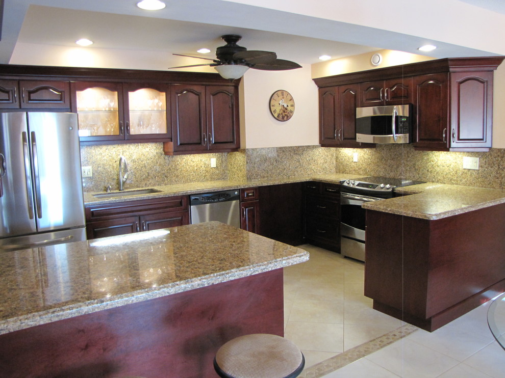 Example of a transitional kitchen design in Miami