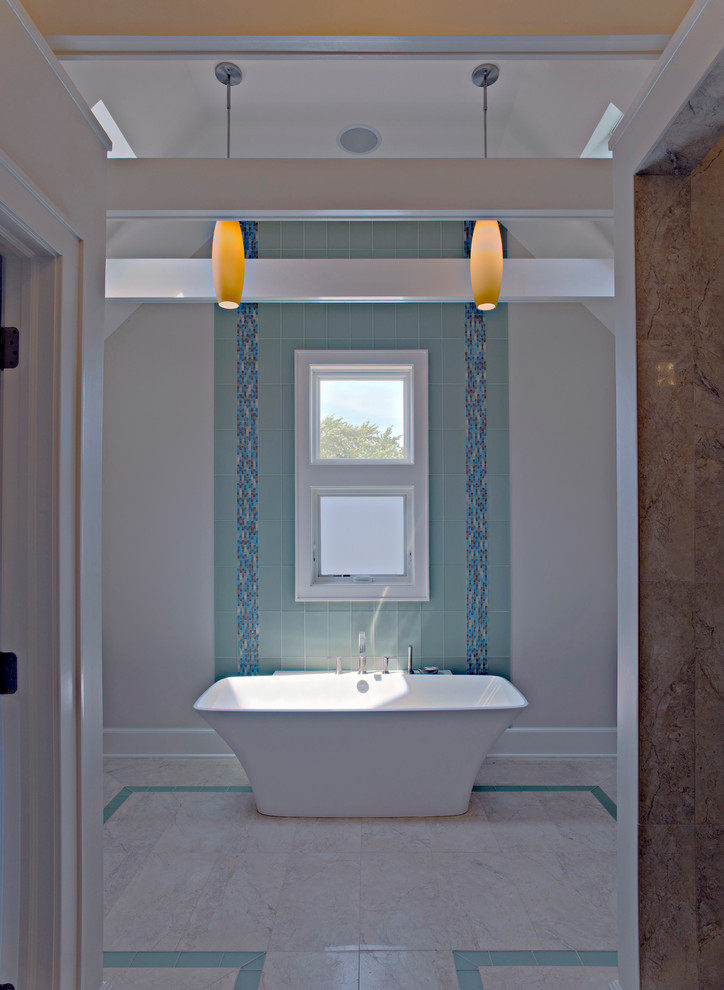 Freestanding bathtub - large traditional blue tile and glass tile freestanding bathtub idea in Chicago