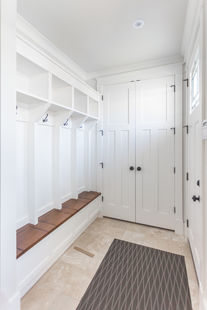 Inspiration for a mid-sized modern mudroom with white walls, linoleum floors, a double front door, a white front door and beige floor.