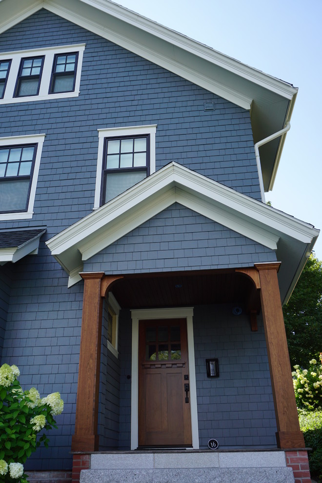 Total Transformation in Evening Blue Farmhouse Exterior Boston