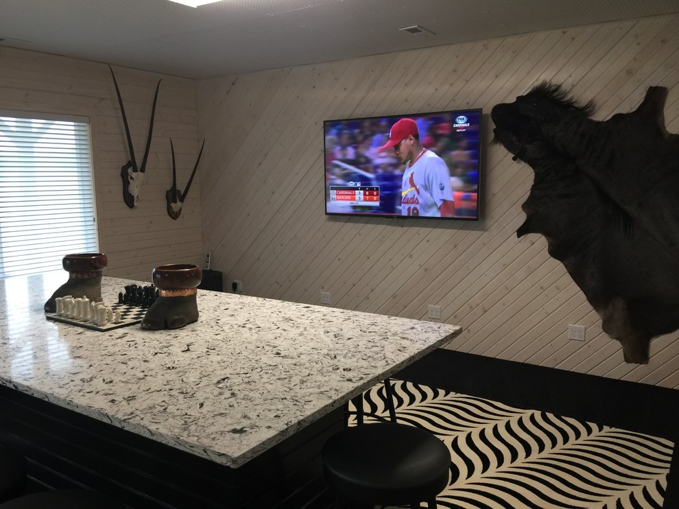 Inspiration for a mid-sized rustic underground carpeted basement remodel with beige walls and no fireplace