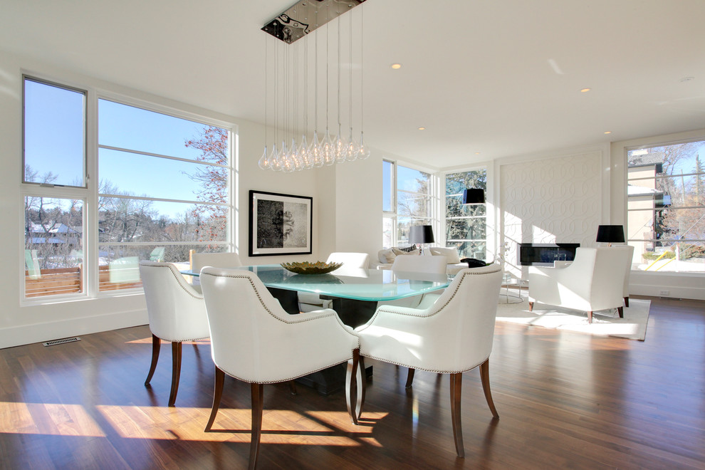 Photo of a contemporary open plan dining in Calgary.
