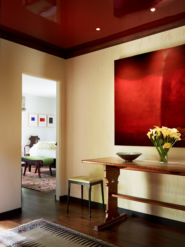 Inspiration for a contemporary hallway in San Francisco with beige walls and dark hardwood floors.