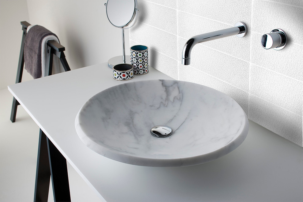 Inspiration for a large bathroom in San Francisco with a vessel sink, open cabinets, black cabinets, marble benchtops, white tile, glass tile, white walls and concrete floors.