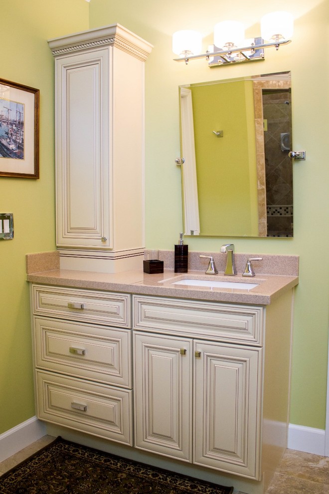 Large transitional master bathroom in Atlanta with an undermount sink, furniture-like cabinets, beige cabinets, granite benchtops, a drop-in tub, a corner shower, a two-piece toilet, beige tile, green walls and marble floors.