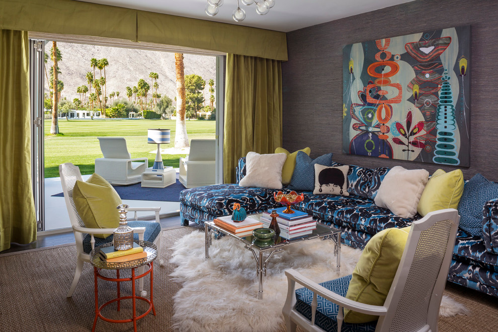 This is an example of a midcentury formal living room in Los Angeles with grey walls.