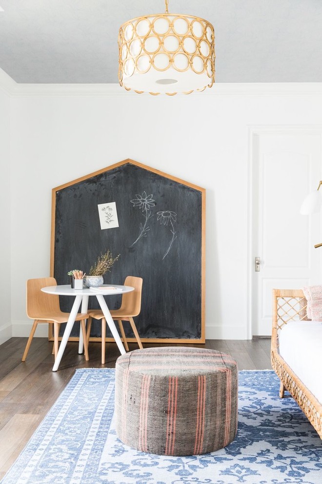 Design ideas for a large transitional gender-neutral kids' playroom in Salt Lake City with white walls and dark hardwood floors.