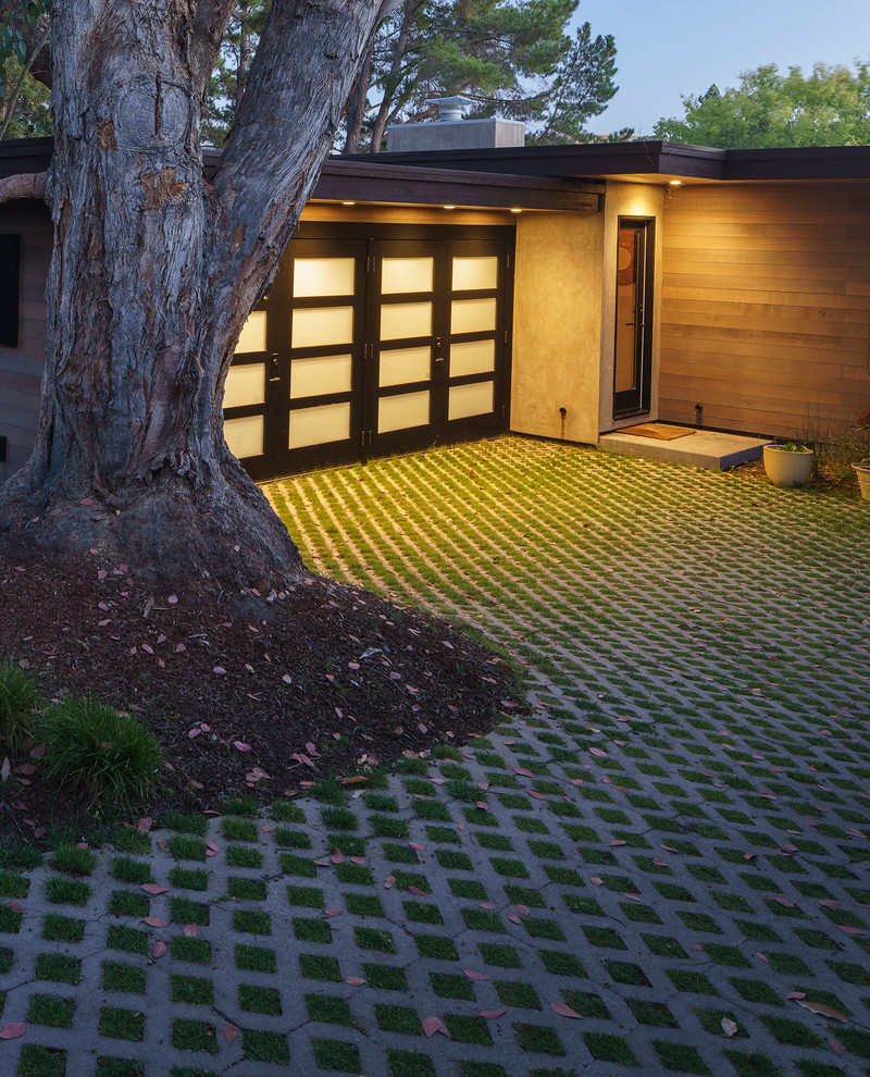 Design ideas for a large midcentury front yard driveway in San Francisco with concrete pavers.