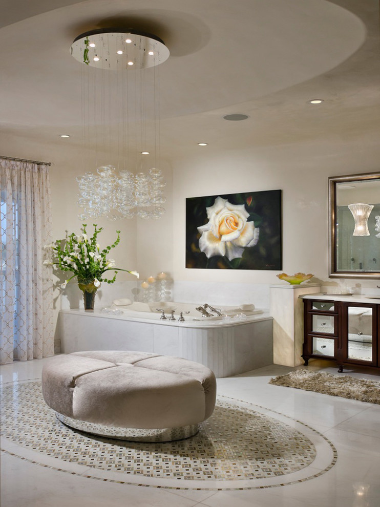 Expansive mediterranean master bathroom in Miami with an undermount sink, glass-front cabinets, dark wood cabinets, granite benchtops, a drop-in tub, an open shower, a one-piece toilet, beige tile, ceramic tile, beige walls and marble floors.