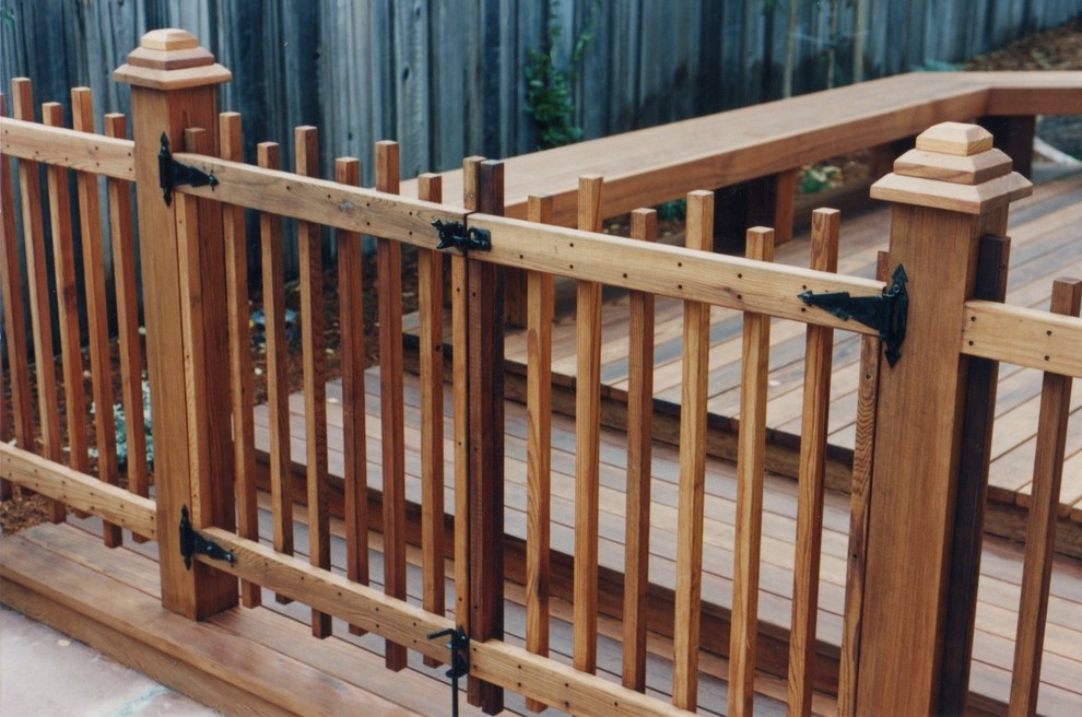 This is an example of a large arts and crafts backyard deck in San Francisco with no cover.