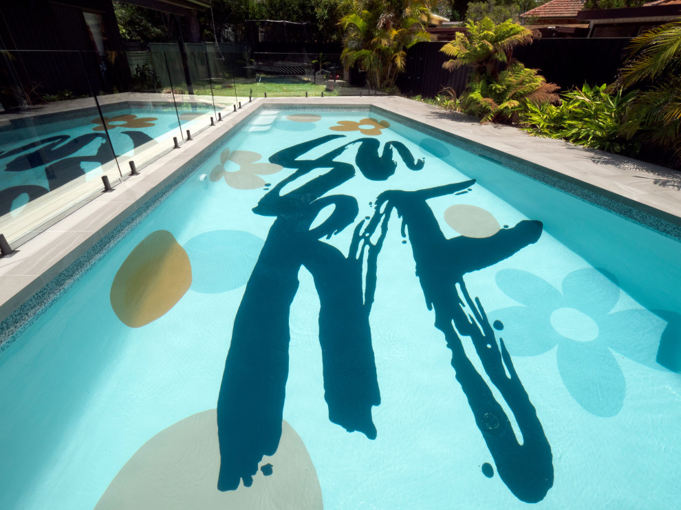 This is an example of a mid-sized contemporary pool in Sydney.