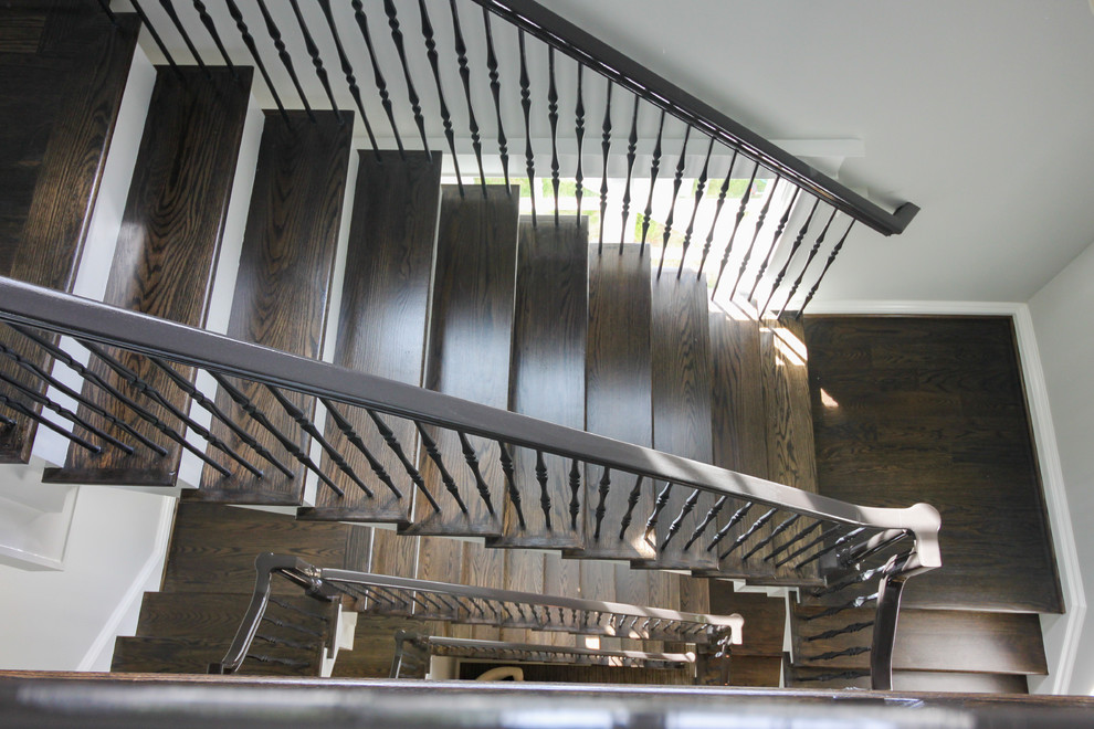 Staircase - large transitional wooden l-shaped mixed material railing staircase idea in DC Metro with painted risers