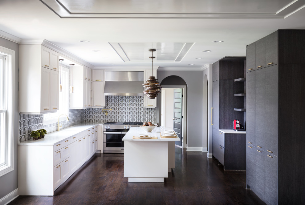 Kitchen - transitional l-shaped dark wood floor and brown floor kitchen idea in New York with shaker cabinets, white cabinets, multicolored backsplash, stainless steel appliances, an island and white countertops